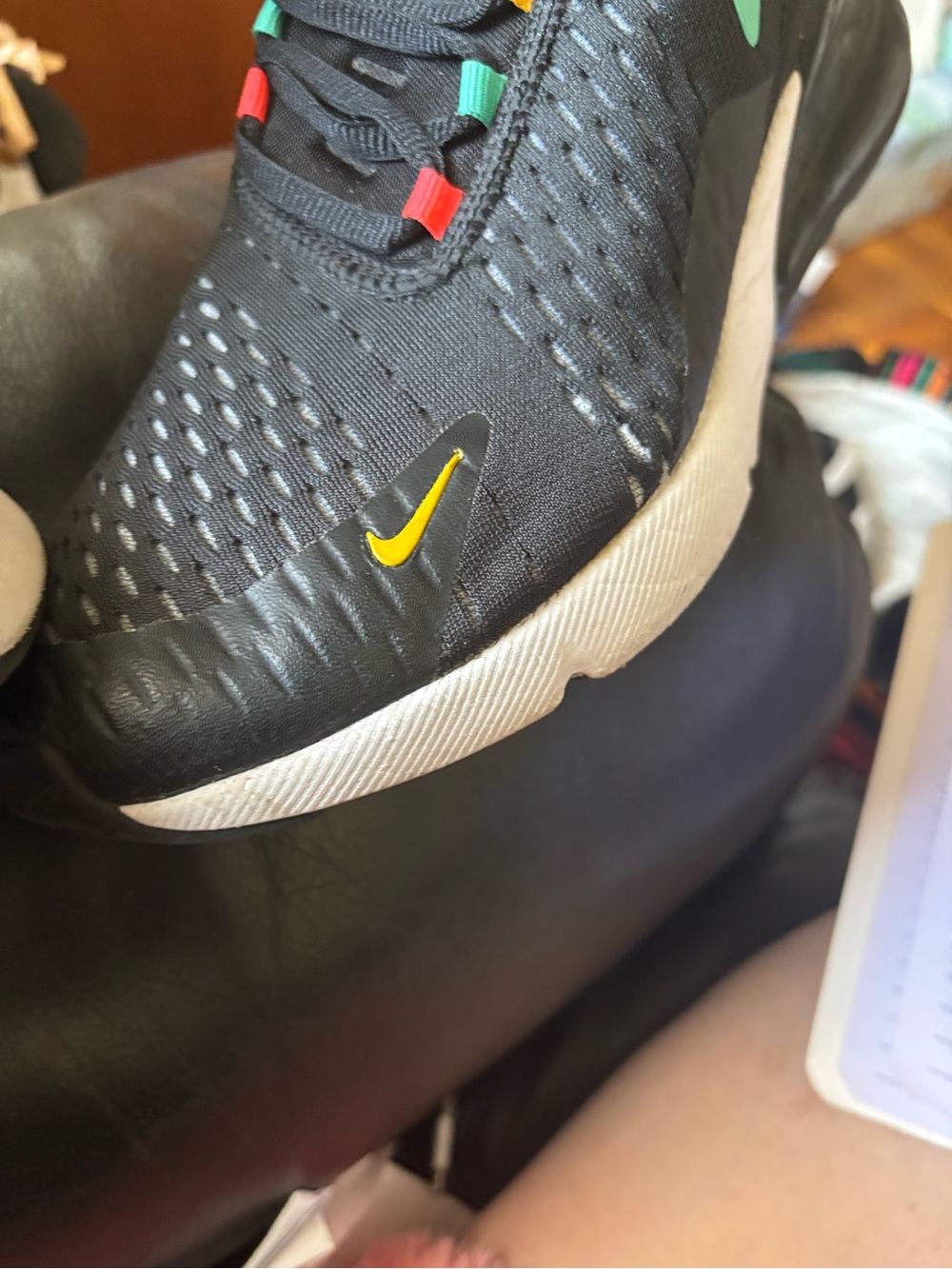 Nike Kids Black Sneakers with Yellow Swoosh and Multicolor Lace Tabs